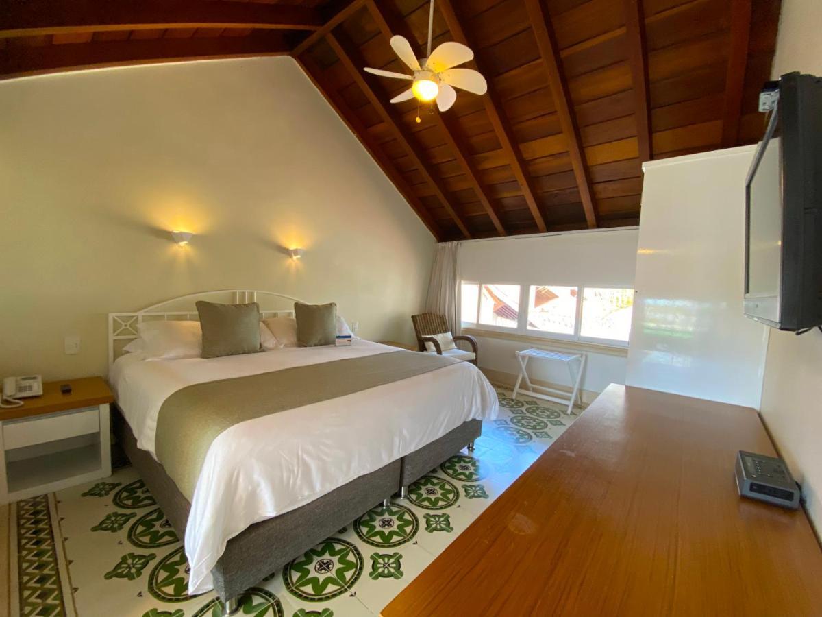 Hotel Las Americas Casa De Playa Картахена Экстерьер фото A room at the hotel
