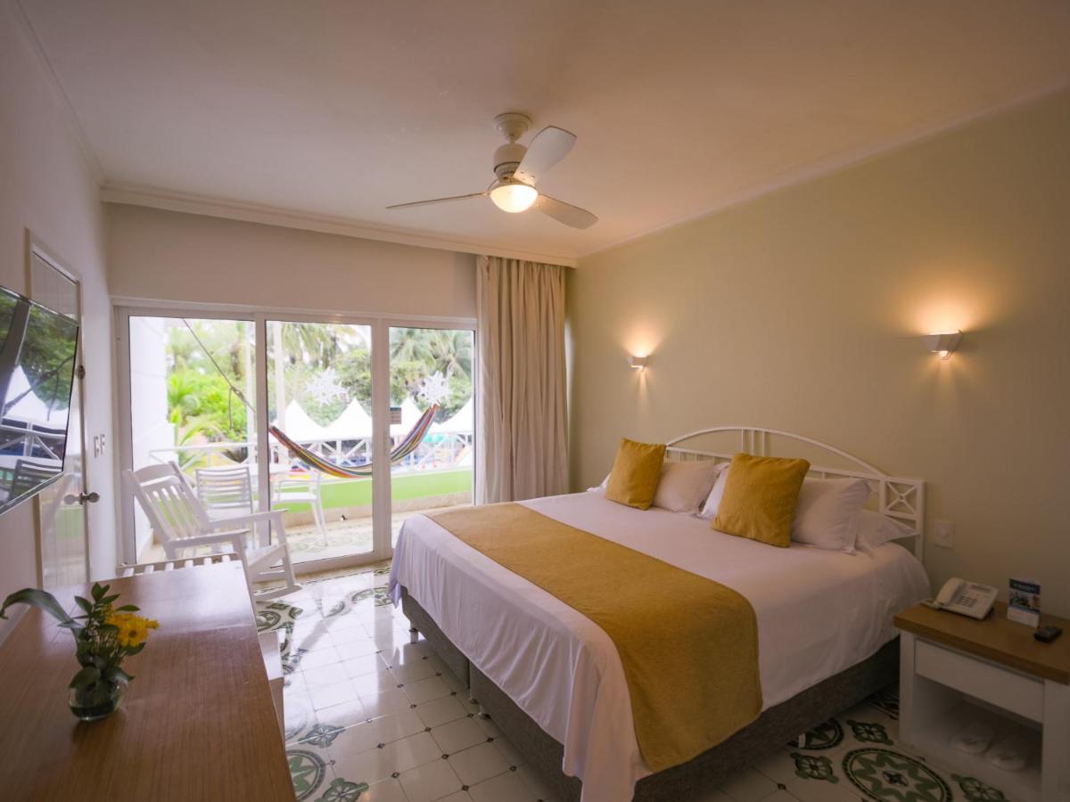 Hotel Las Americas Casa De Playa Картахена Экстерьер фото A bedroom at the hotel